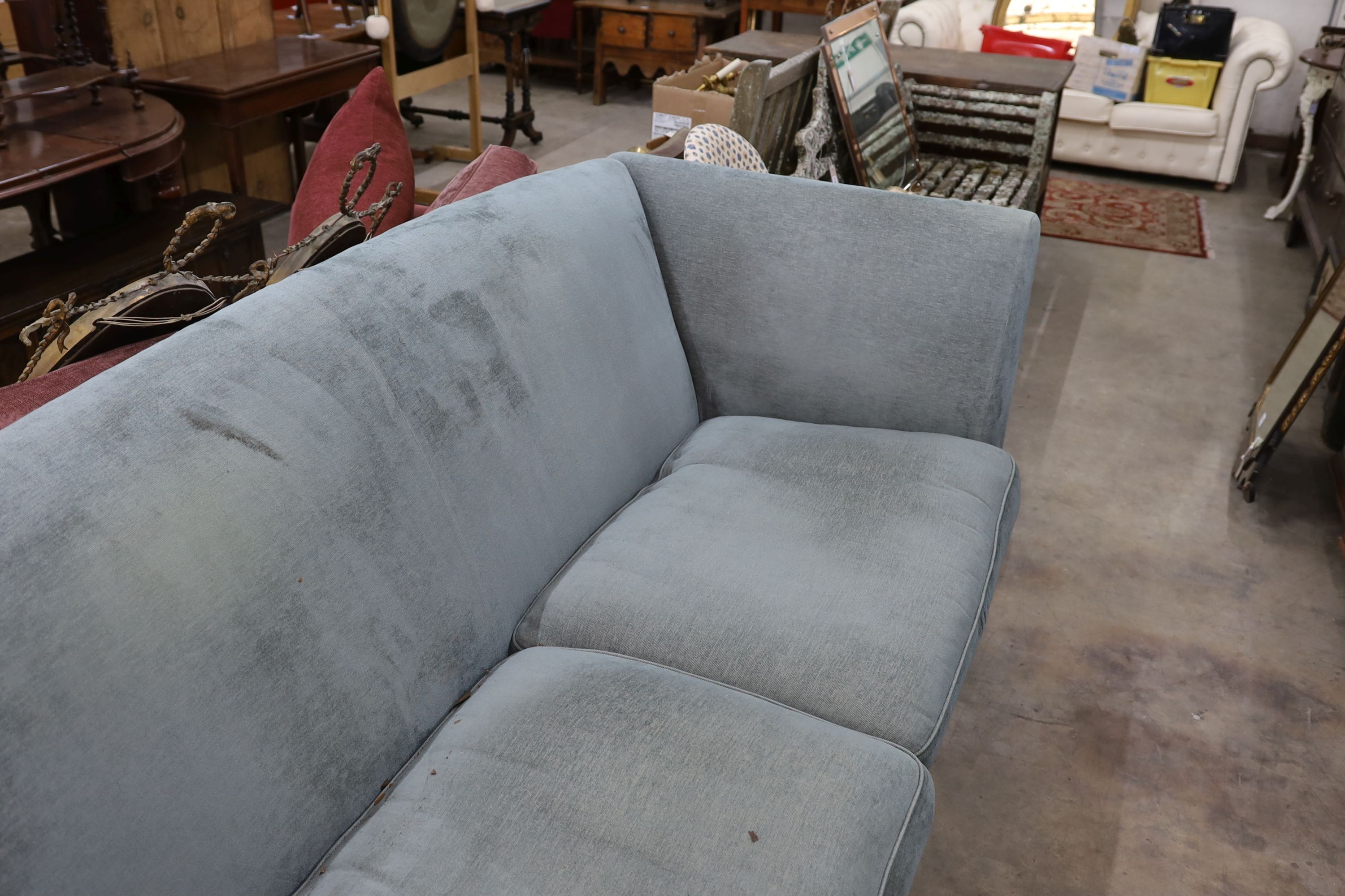 A large contemporary turquoise fabric sofa, length 230cm, depth 96cm, height 93cm